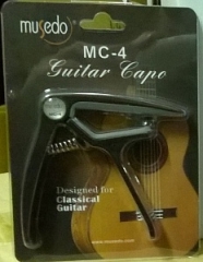 Каподастр Musedo MC-4 для гитары универсальный.